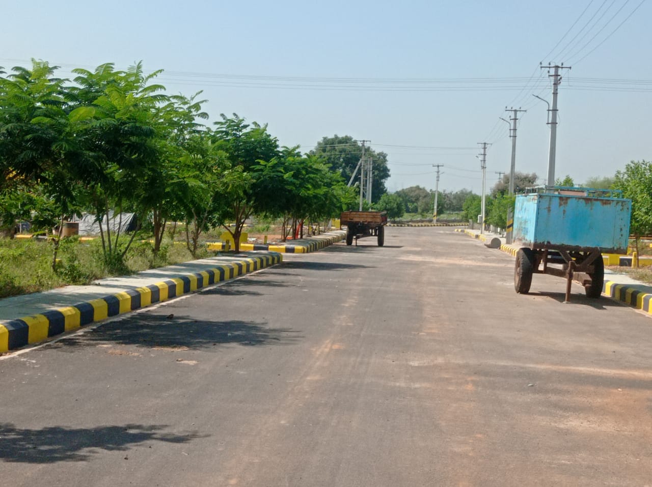 RAJADHANI DTCP OPEN PLOTS MUMBAI HIGHWAY